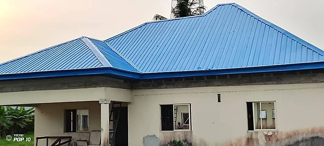 Completed bungalow, blue aluminium roof