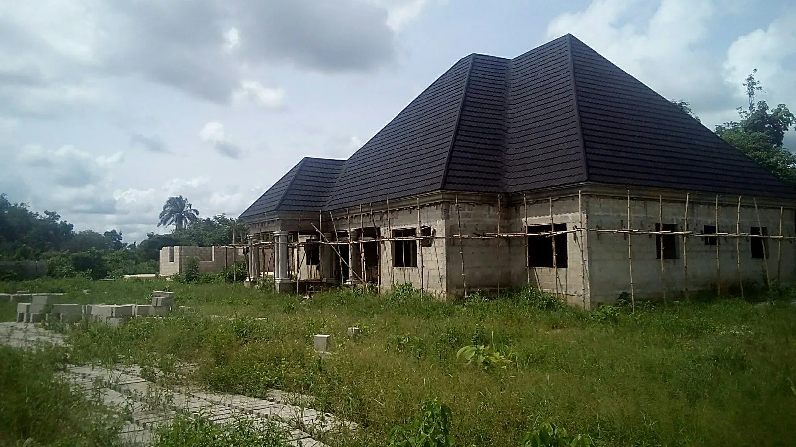 Completed bungalow with charcoal hip roof